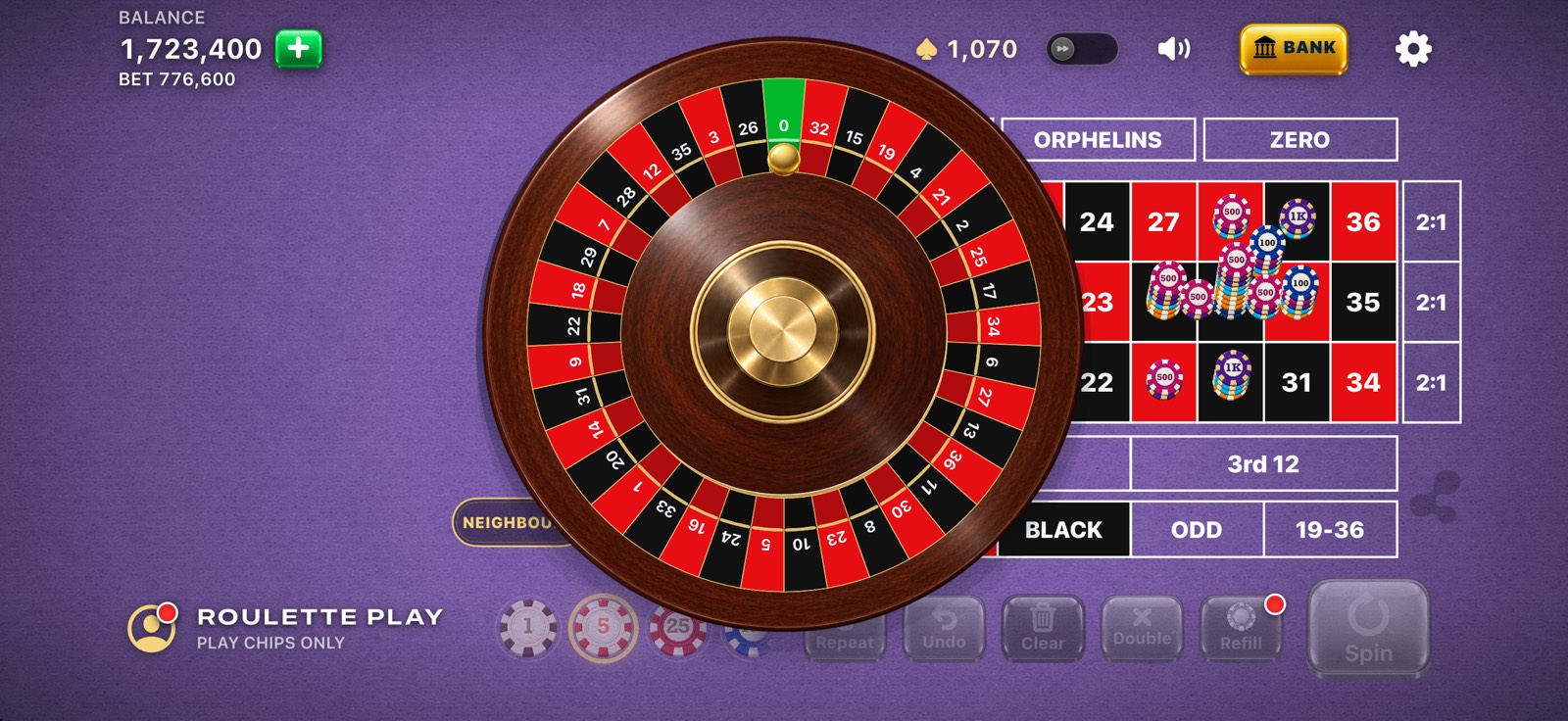 Roulette Play on iPhone in landscape with a purple table theme and a gold roulette ball.